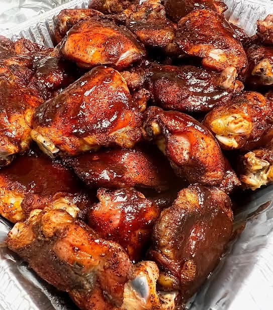 Mike & Zach's signature Sticky Chicken — maple-smoked and glazed
